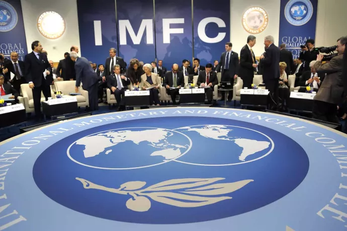Delegates arrive for an IMFC plenary session during the IMF and World Bank spring meetings in Washington